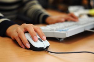 woman-using-computer-1208422-m